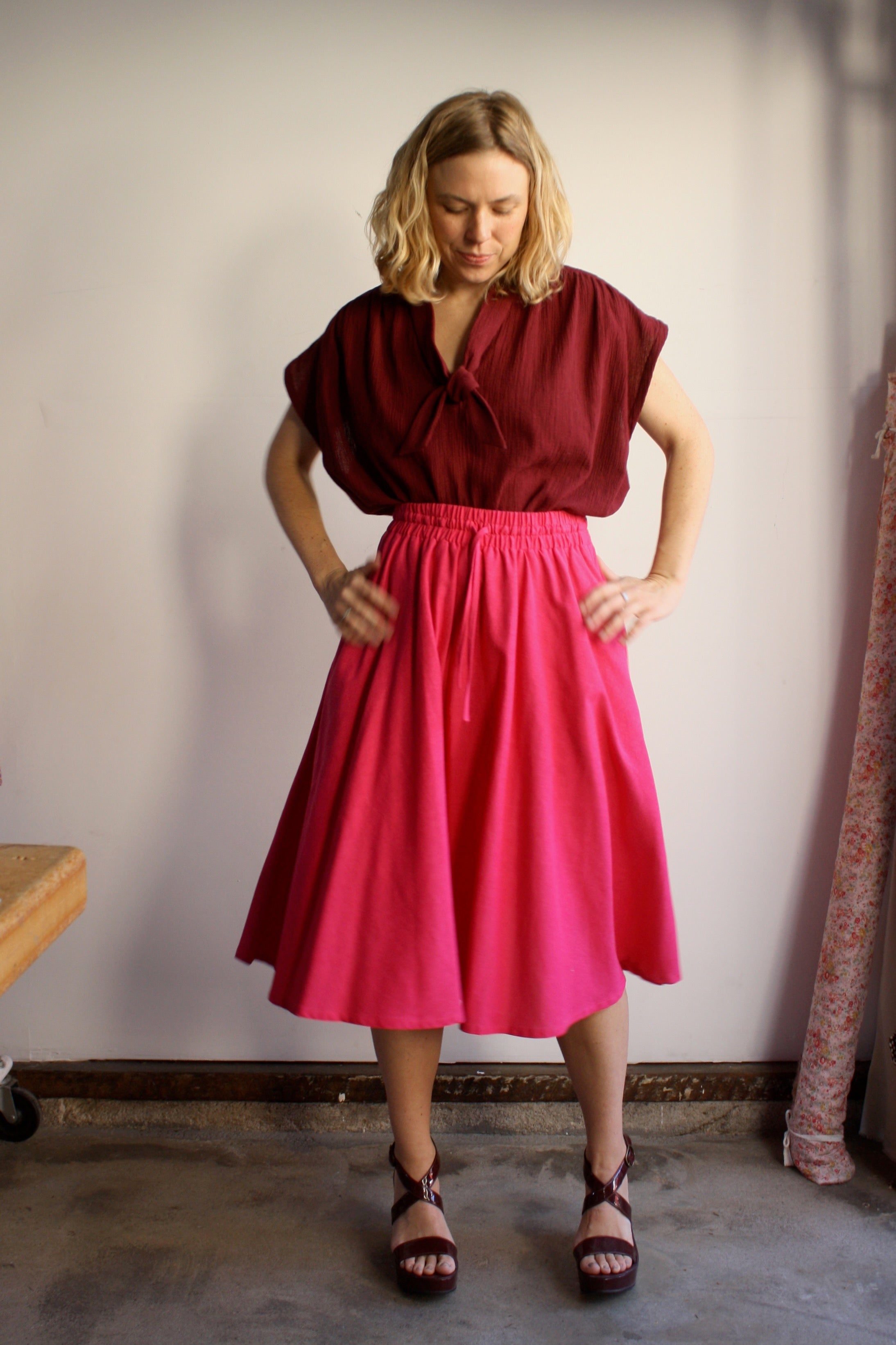 Myrtle Faye blouse in burgundy blossom styled with Ella skirt